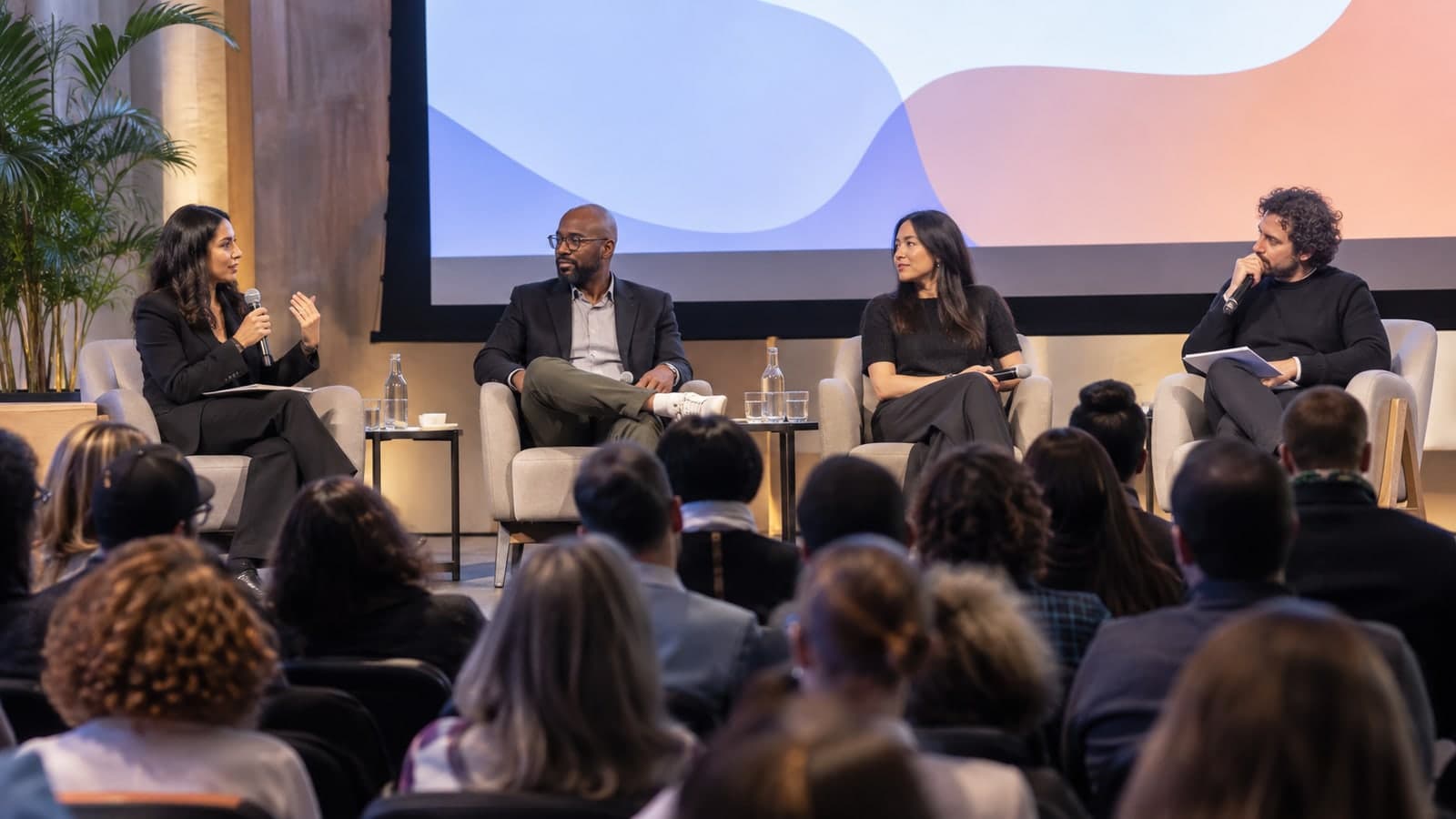 Panel discussion before a seated audience